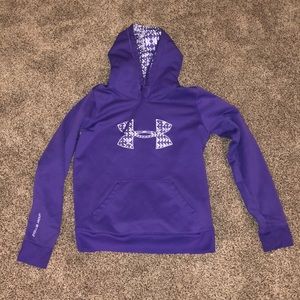 Purple under armour sweatshirt.